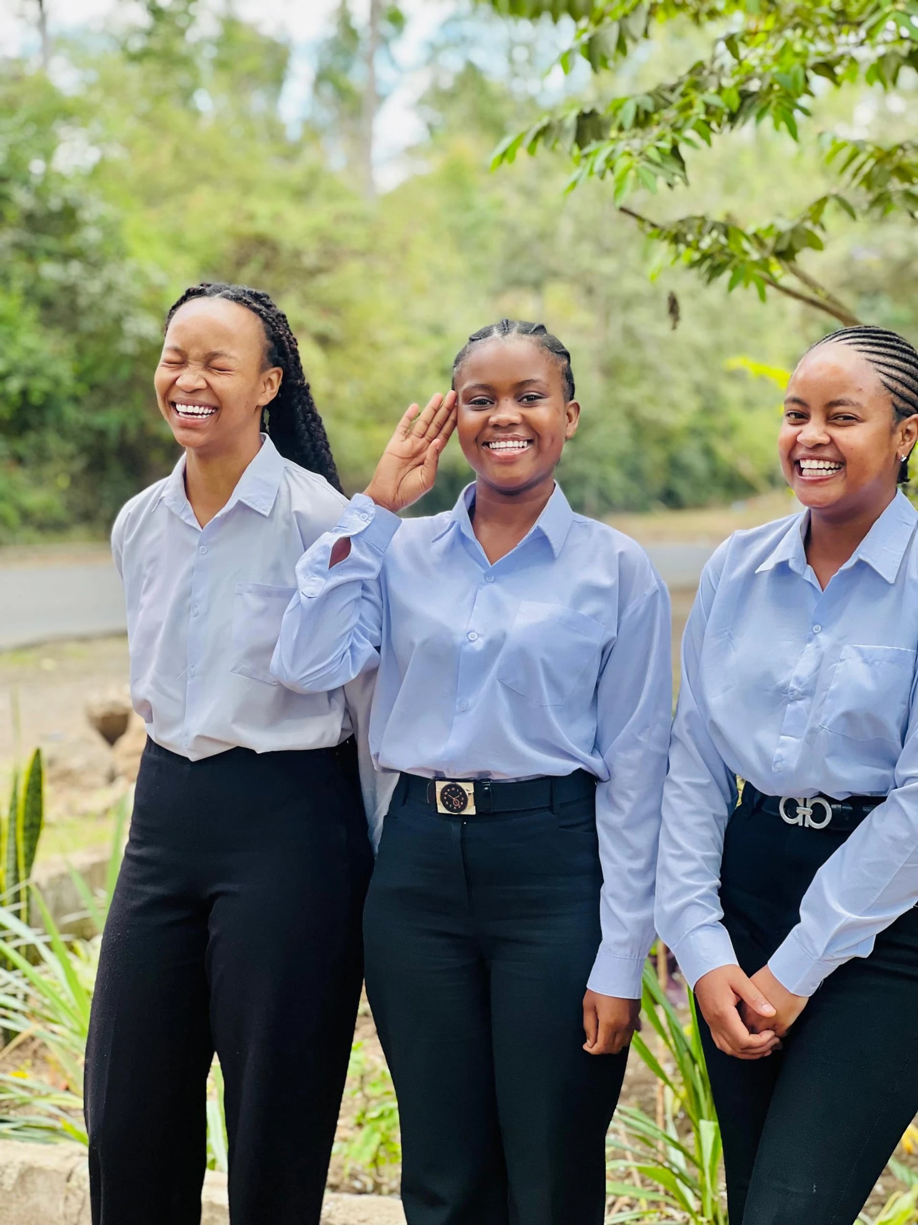Three Keepsake students smiling together outdoors